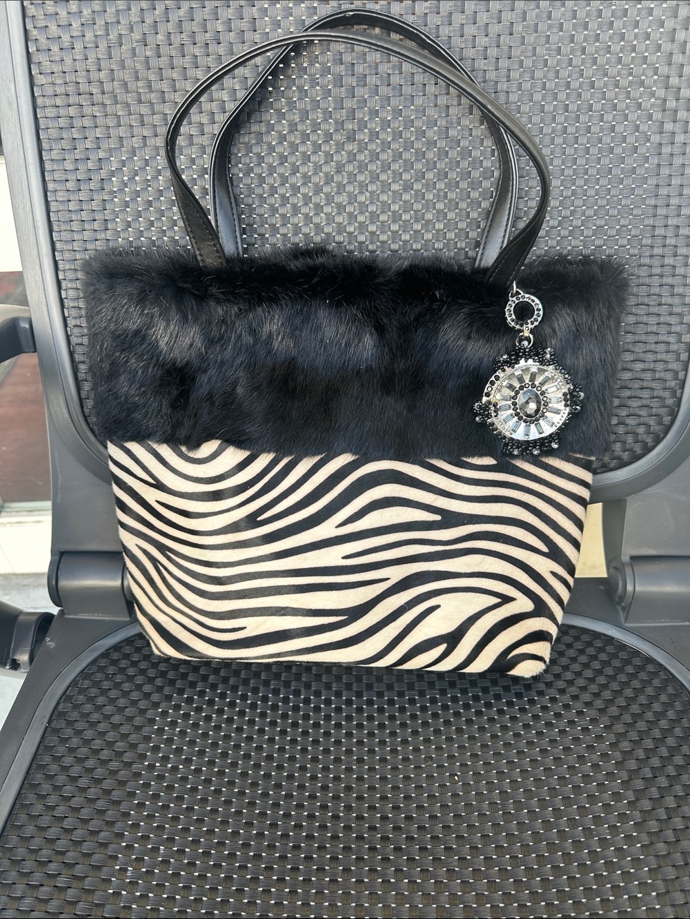 Black Faux Fur & Zebra-Print Tote with Decorative Charm